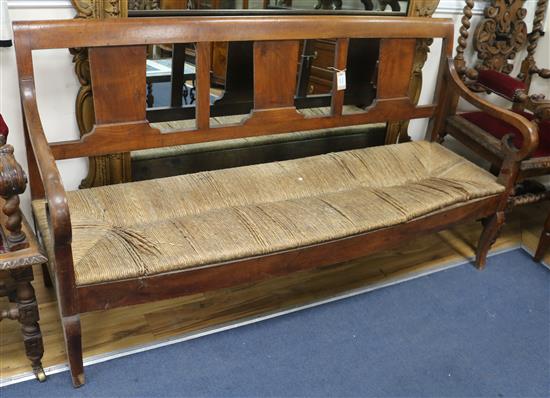 A French provincial rush seated bench W.176cm